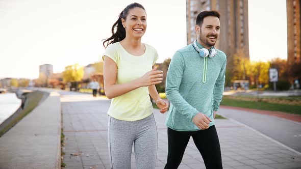 Athletic Couple Jogging Together