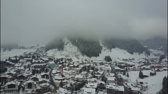 View of a Small Town in Switzerland Covered with Snow in Winter alt