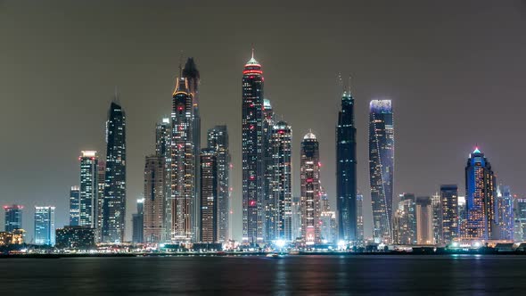 Dubai Marina Skyline Night Timelapse As Seen From Palm Jumeirah in Dubai UAE alt