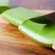 Cutting Fresh Aloe Vera Sliced on a Chopping Board - VideoHive Item for Sale