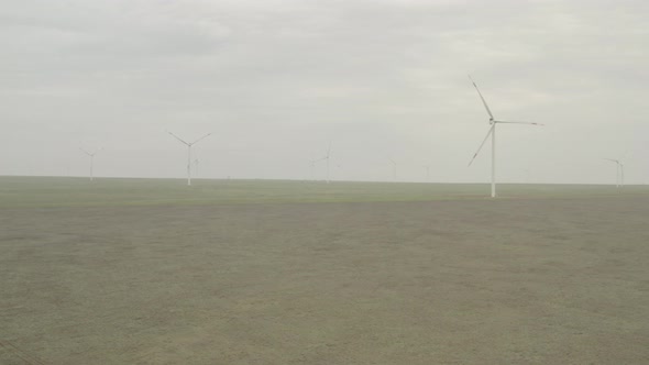 Aerial View of Powerful Wind Turbine Farm for Energy Production alt