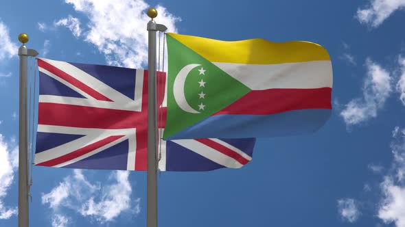 United Kingdom Flag Vs Comoros Flag On Flagpole alt