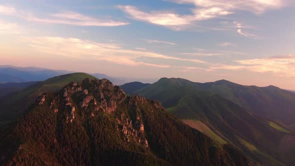 Cinematic Aerial Video of the Golden Hour on Top of a Mountain in a National Park at Sunset