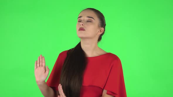 Portrait of Pretty Young Woman Is Strictly Gesturing with Hands Shape Meaning Denial Saying NO alt