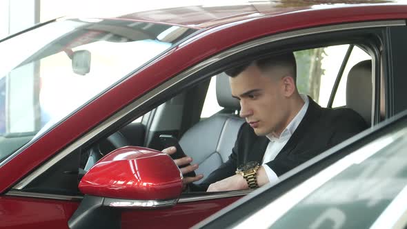 Auto business, car sales, seller with a folder in your hands alt