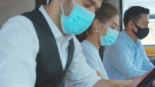 new normal lifestyle concept business people wearing mask sit with social distancing working alt