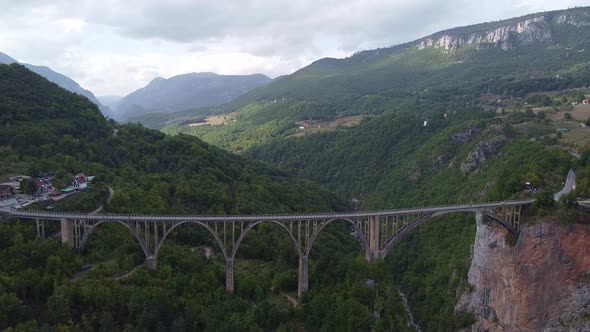 Long Road Bridge Over a Valley in the Mountains