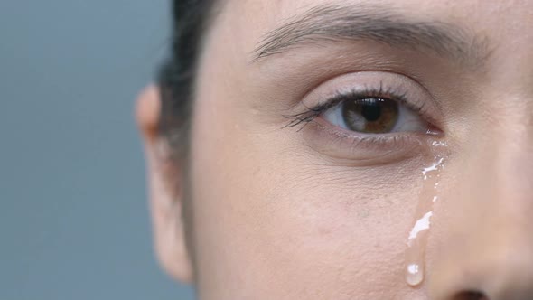 Upset Woman Crying Drop Of Tear Running Down Her Cheek Eye Discharge Problems Stock Footage 