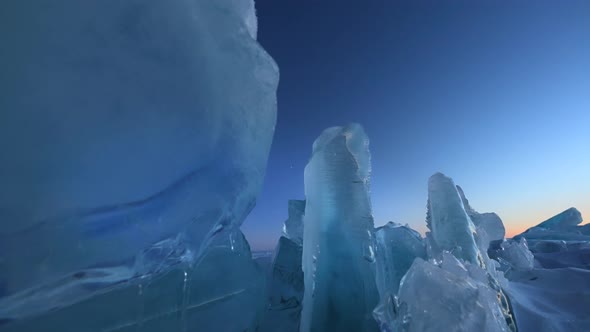 Huge Broken Blue Ice Hummocks on Frozen Surface of Baikal Lake