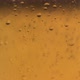 Macro Shot Of Fine Bubbles Rising In A Glass With beer - VideoHive Item for Sale
