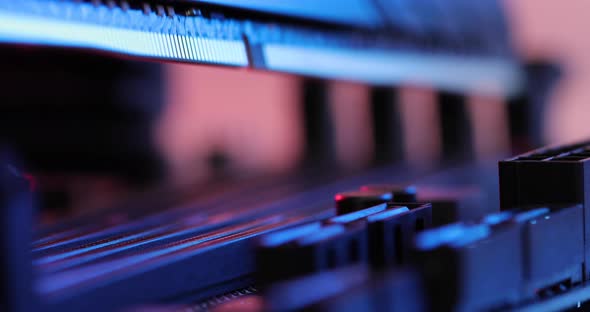 manipulating and installing processor on the motherboard in details with blur and selective focus alt