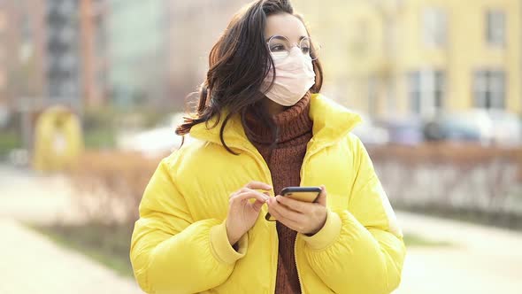 Woman with protective mask walking