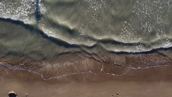 Soft Wave of the Sea on the Sandy Beach