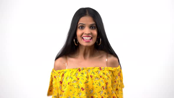 Excited Indian girl saying Yes alt