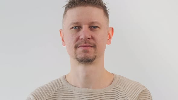 Young Handsome Man Looking at the Camera alt