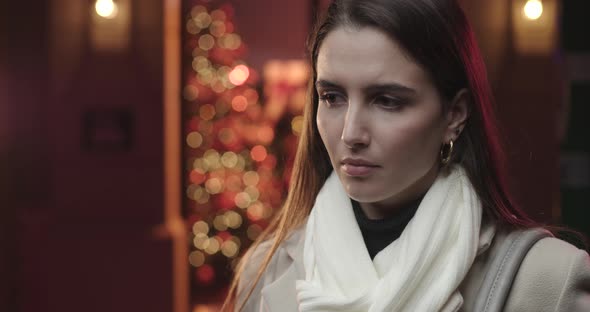 Young woman sneezing