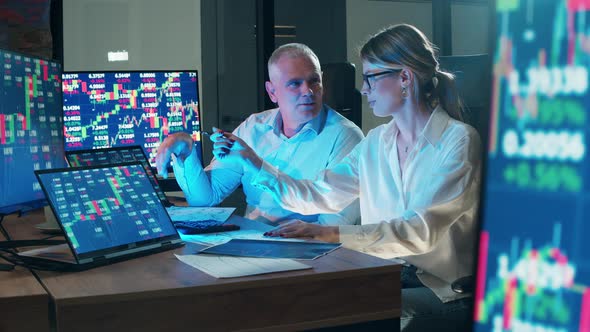 Stockbrokers are Discussing Stock Prices Data alt