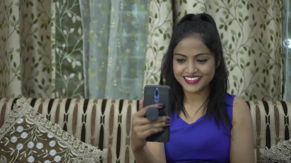 Indian Girl Laughing While Video Calling