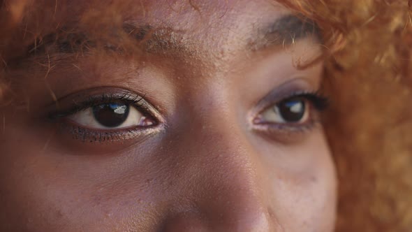 Eyes Close Up. African American Black Happy Woman Opening Her Eyes. Meditation and Wellbeing Concept alt