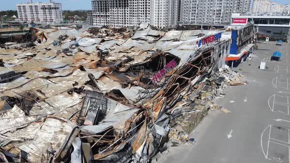 Wartorn Building of a Shopping Center in Bucha Ukraine alt
