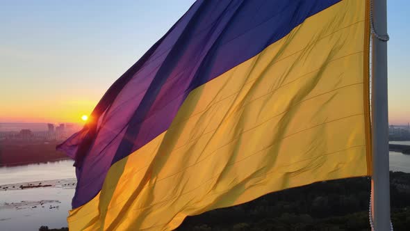 Ukrainian Flag in the Morning at Dawn. Aerial. Kyiv. Ukraine alt