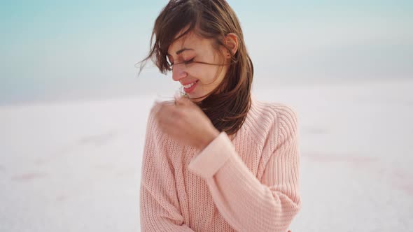 Close Up Portrait Pretty Woman in Pink Knitted Sweater in Beautiful Nature Landscape alt