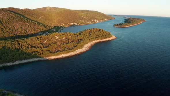 Aerial View of the Green Shores of the Island Korcula at Sunset Croatia alt