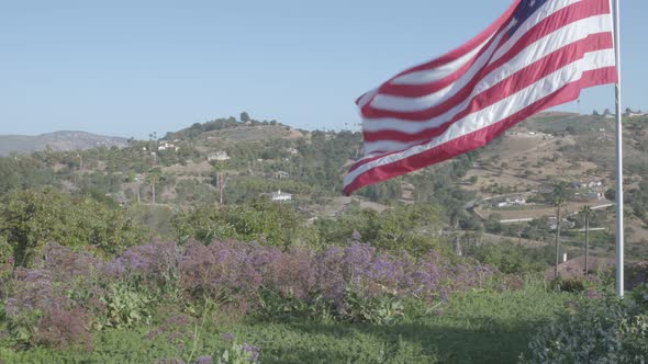 American Flag flying high over Fallbrook, California Mountains alt