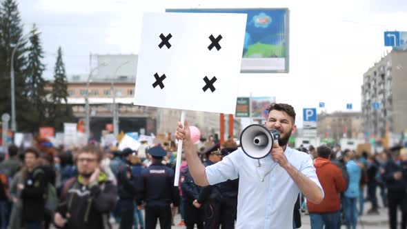Man at Political Meeting with Banner with Points for Tracking To Copy Space Text alt