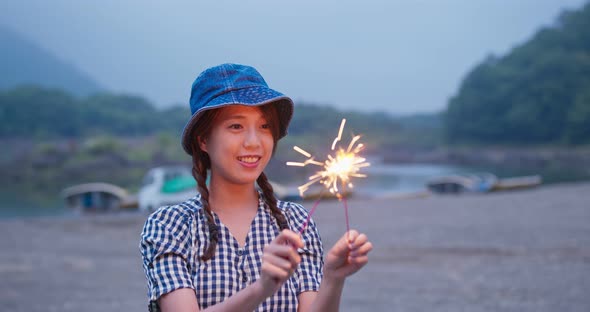 Woman Play Sparkler Firework alt