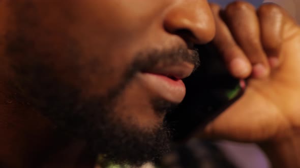 Close Up African-American Mouth Talks By Smartphone 