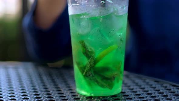 Girl Mixes Cocktail alt