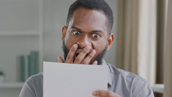 Excited Black Male Executive Receiving Mail with Salary Growth Payment Business Loan Approval alt