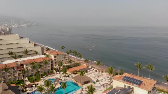 Aerial footage of the beautiful beach and town of Puerto Vallarta in Mexico
