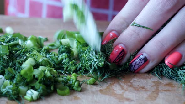 Female Prepares Vegetable Salad Chopped Dill and Green Onions