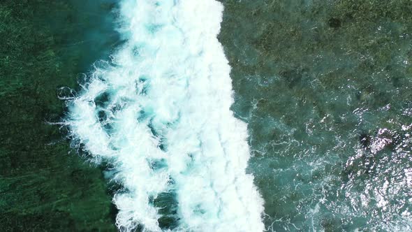 Natural above clean view of a sandy white paradise beach and aqua turquoise water background alt