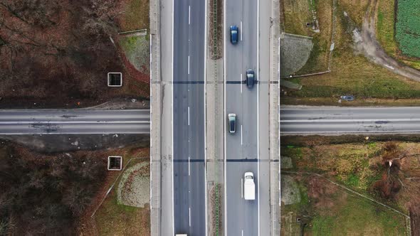 Cars Moving on Road Bridge Aerial View alt
