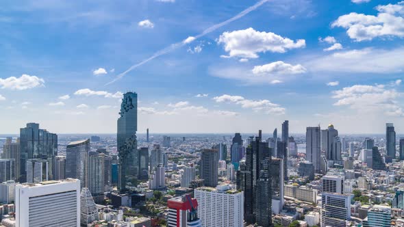 Bangkok business district city center above Silom area, with cloud pass over, zoom in – Time Lapse