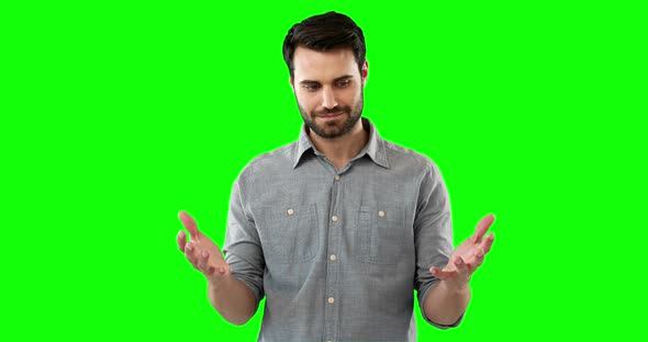 Man pretending to be holding an invisible object alt
