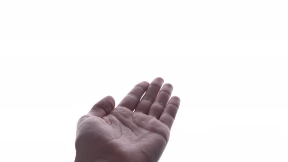 Person does hand gesture with bright white backdrop 12 alt
