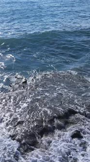 Vertical Video Sea Near the Coast  Closeup of the Coastal Seascape alt