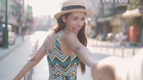 Young Brunette Stylish Fashion Woman Holding Hands with Beautiful Toothy Smile alt