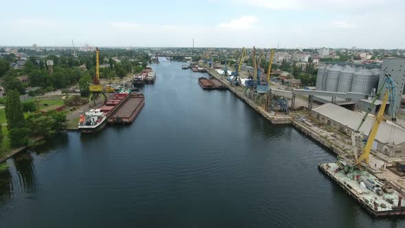 Aerial Shot of Dnipro Tributory Full of Barges and Boats on a Sunny Day in Summer