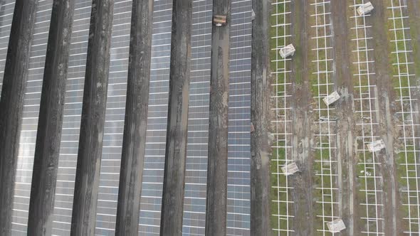 Rows of Solar Cells Half Installed Half in Progress Green Technology Aerial alt