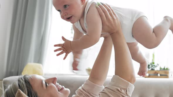 Loving Mommy and Cute Toddler Having Fun alt