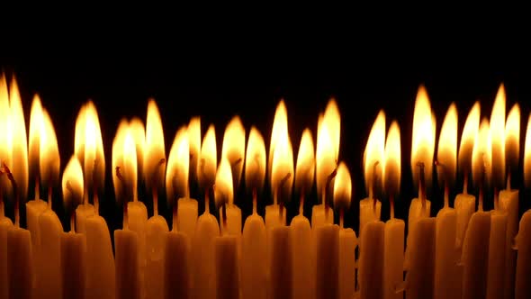 Many Candles Burning In Church alt