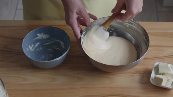 Woman Is Making Dough for Bakery