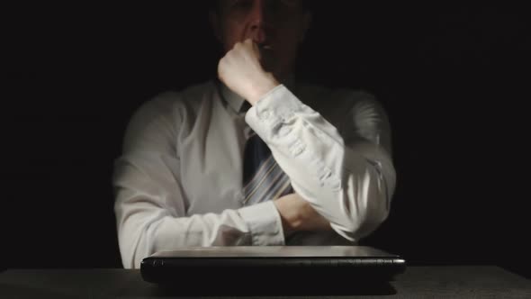 Businessman Is Shutting Burning Laptop And Worried