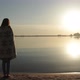 Woman Standing Near the Sea Shore at Dawn - VideoHive Item for Sale