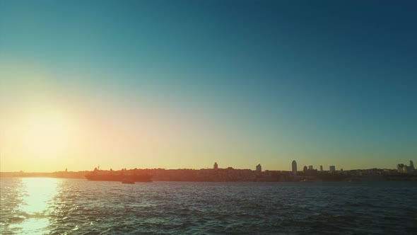 Silhouette of a ship at sunset. Turkey Istanbul sea scene, panoramic landscape